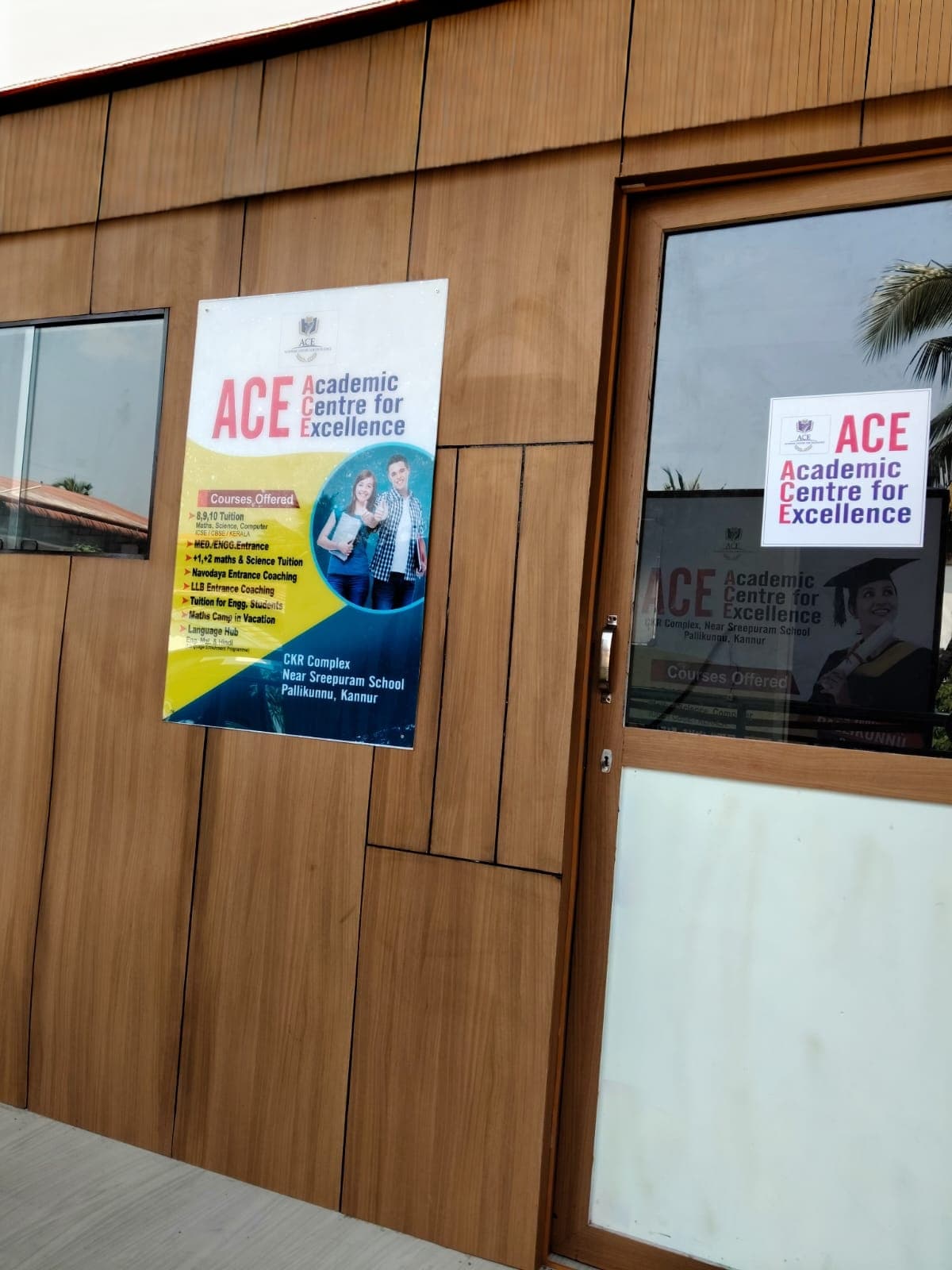 Group of diverse happy students studying in a modern bright classroom